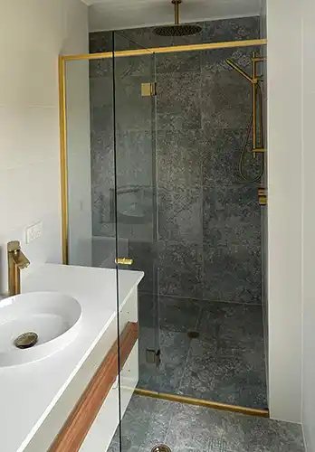 Shower with Brushed Brass Frame
